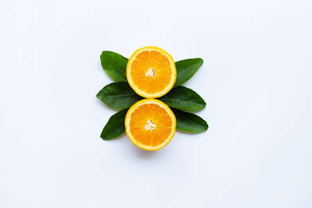 Fresh orange citrus fruit with leaves isolated on white wooden background.  Copy spaceの写真素材