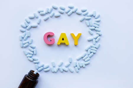 PrEP ( Pre-Exposure Prophylaxis). used to prevent HIV with GAY  wooden alphabet on white background.