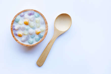 Dumplings in coconut cream on white