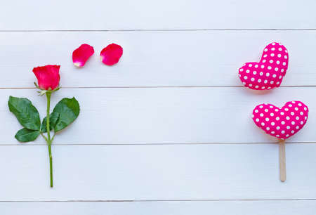 Rose with hearts on white wooden for Valentine's day background.