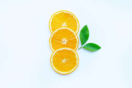 Orange fruit slices on white background.