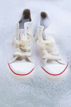 Soak shoes before washing. Cleaning Dirty sneakers.