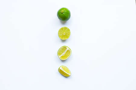 Fresh limes on white background.
