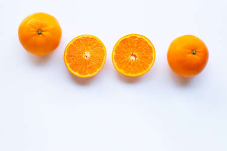 Fresh orange citrus fruit on white background.の写真素材