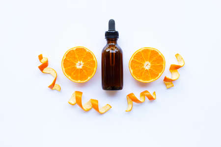 Essential oil of orange on white background.の写真素材