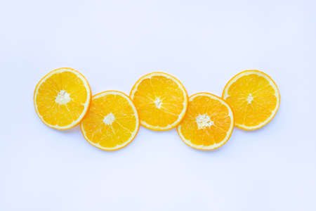 Fresh orange citrus fruit with leaves isolated on white backgroundの写真素材