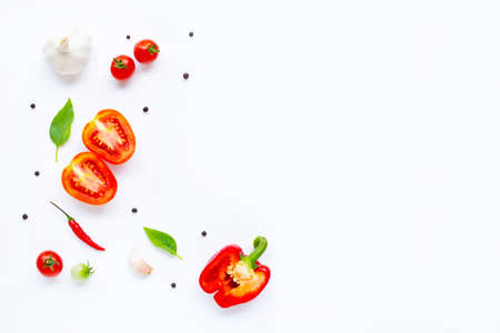 Various fresh vegetables and herbs on white background. Healthy eating conceptの写真素材