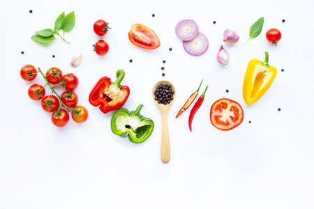 Various fresh vegetables and herbs on white background. Healthy eating conceptの写真素材