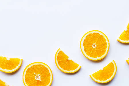 Fresh orange slices on white background. Copy spaceの写真素材