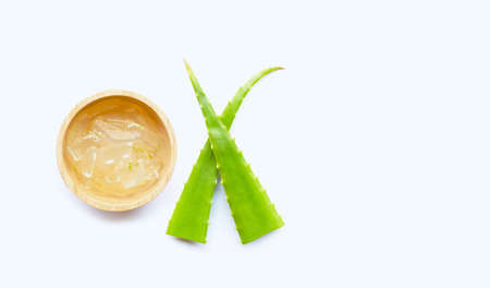 Cut Aloe Vera leaves with gel on white background. Copy spaceの写真素材