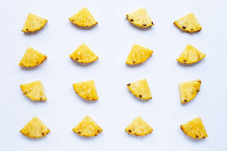 Pineapple slices on white background.