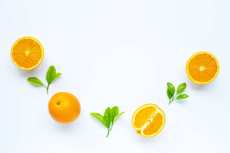 High vitamin C, Juicy and sweet. Fresh orange fruit with green leaves  on white background. Copy...
