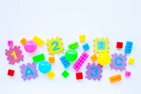 Colorful Kids toys on white background. Copy spaceの写真素材