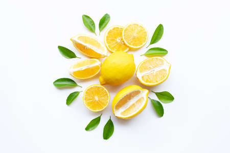 lemon and slices with leaves isolated on white background.の写真素材