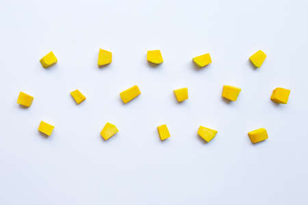 Green pumpkin vegetable cube slices isolated on white background. Top viewの写真素材