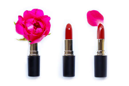 Lipsticks with rose flower on over white background. Beautiful Make-up conceptの写真素材