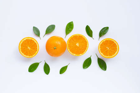Fresh orange citrus fruit with leaves isolated on white background. Juicy and sweetの写真素材