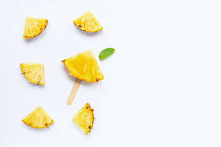 Pineapple slices on white background.の写真素材