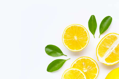 Lemon and slices with leaves isolated on white background. Copy spaceの写真素材