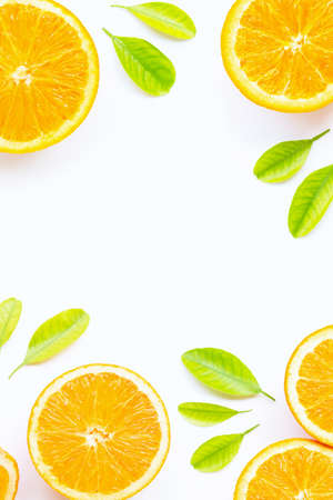 Orange with green leaves isolated on white background. Copy space