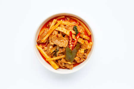 Red curry preserved bamboo shoot with pork, white background.の写真素材