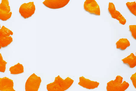 Frame made of mandarin peel isolated on white backgroundの写真素材