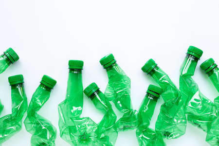 Plastic bottles on white background. Copy space