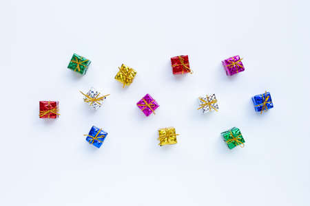 Mini gift boxes on white background. Top view