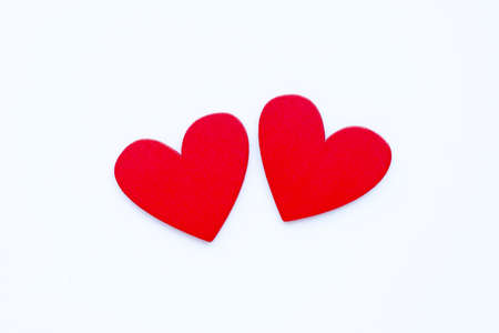 Red wooden hearts on  white background, Valentines day concept の写真素材