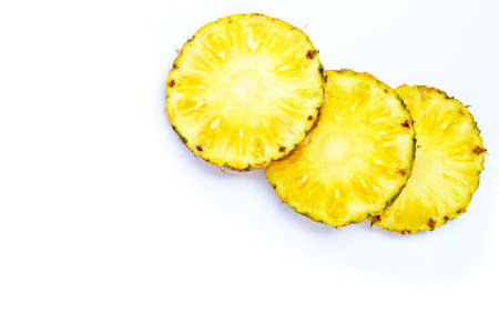 Fresh pineapple slices on white background. Copy spaceの写真素材