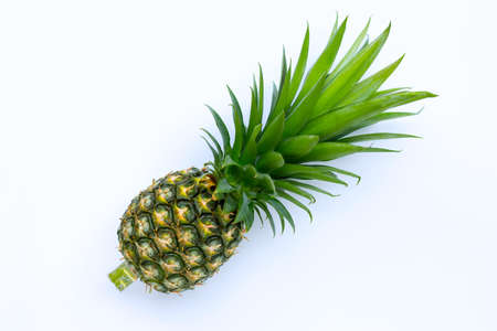 Single whole pineapple on white background. Top viewの写真素材