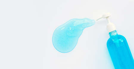 Alcohol hand sanitizer gel in pump bottles for hand hygiene corona virus (Covid-19) protection. Over white background with copy space.の写真素材