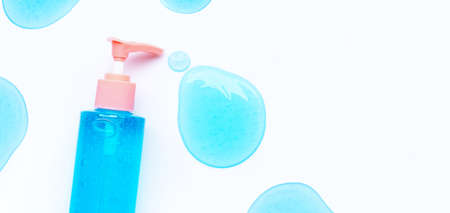 Alcohol hand sanitizer gel in pump bottle on white background with copy space. Hand hygiene corona...