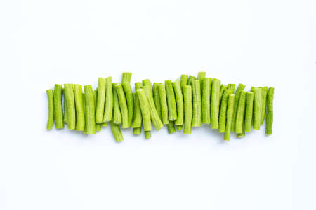 Cut long bean or cowpea on white background. Copy spaceの写真素材