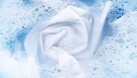 Top view of soak a cloth before washing, white clothの写真素材