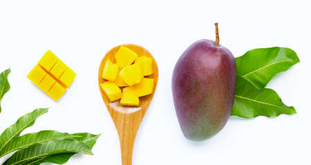 Mango, Tropical fruit with leaves on white background. Top viewの写真素材