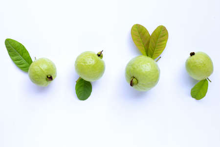 Top view of fresh ripe guava and slices with leaves.の写真素材