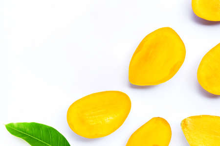 Tropical fruit, Mango  slices with leaf on white background. Top viewの写真素材