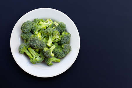 Fresh green broccoli on dark background.の写真素材
