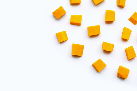 Cut and slices butternut squash on white background.の写真素材