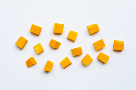 Cut and slices butternut squash on white background.の写真素材