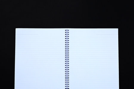 Open notebook on dark