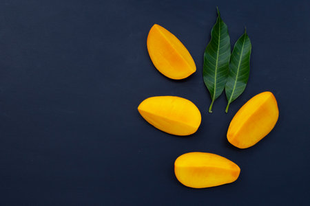 Tropical mango  on darkの写真素材