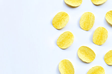 Potato chips on whiteの写真素材