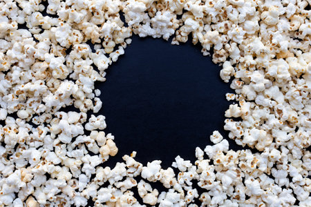 Popcorns with copy space  on dark