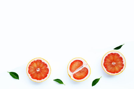 High vitamin C. Juicy grapefruit on white background.