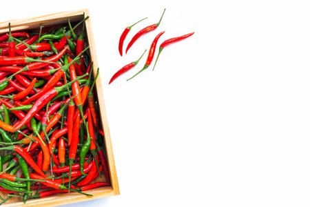 Hot chili peppers on white background. Top viewの写真素材