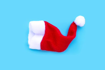 Santa hat on blue background.