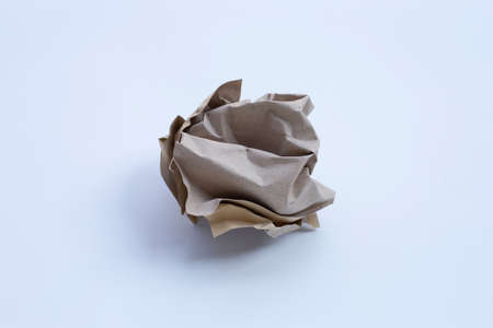 Crumpled white paper ball on dark background. Copy spaceの写真素材