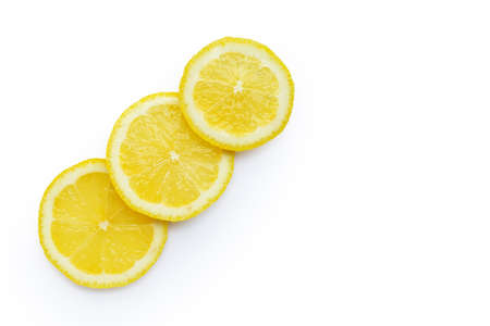 Fresh lemon slices isolated on white background.の写真素材